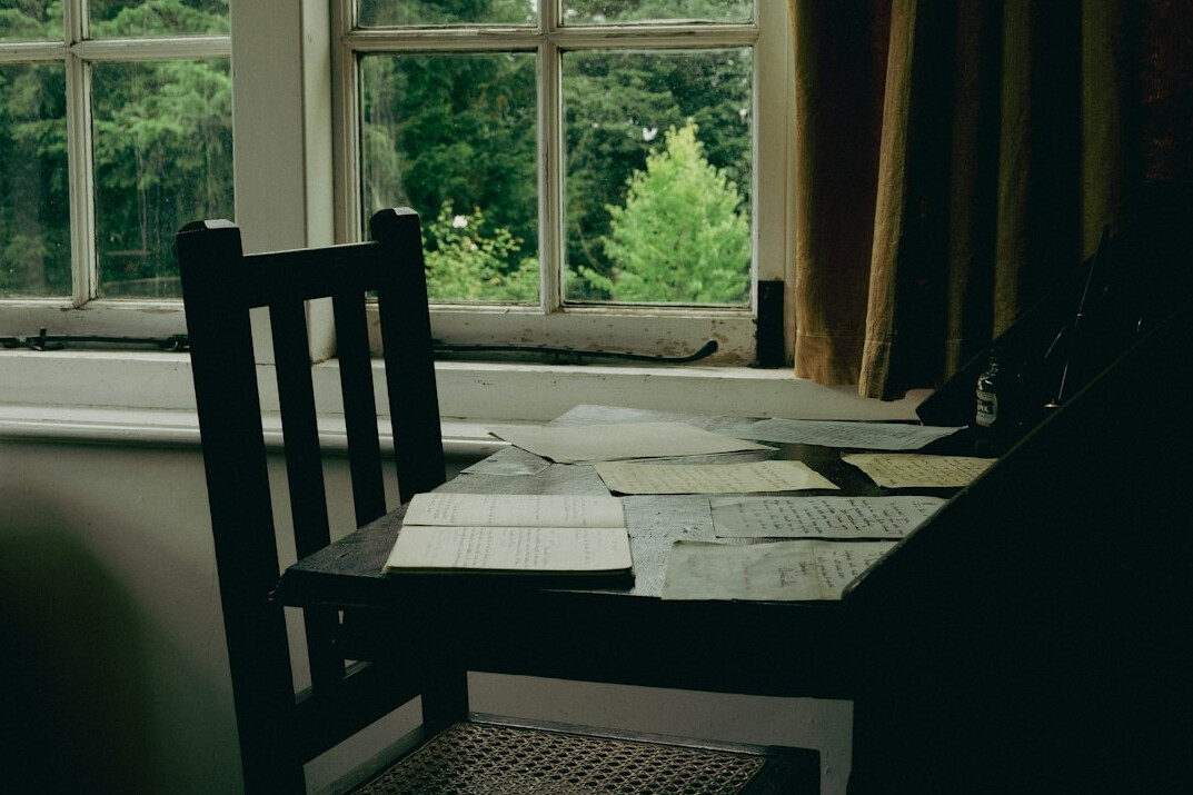 writer desk with papers